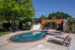 This great backyard has a pool and hot tub along with great outdoor seating areas